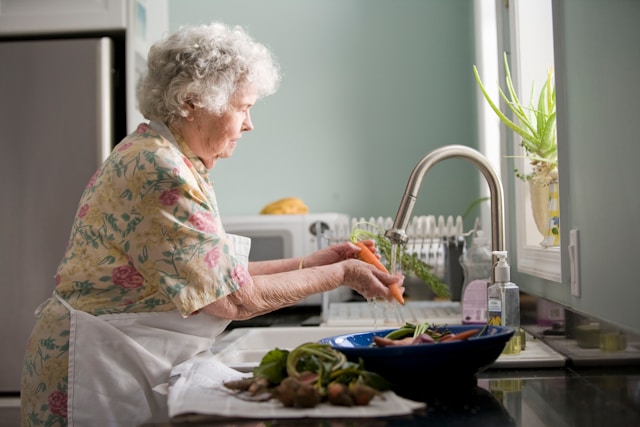 older lady washing up