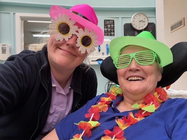 resident and carer in fancy dress