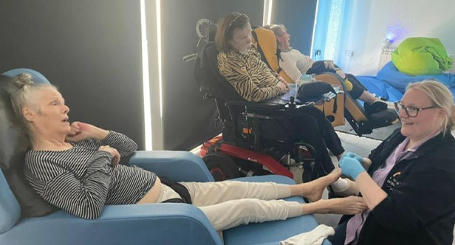 resident getting a foot massage